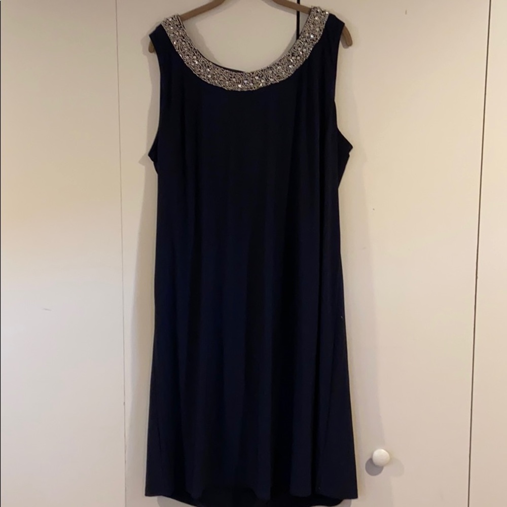 Cocktail dress with sheer overcoat.